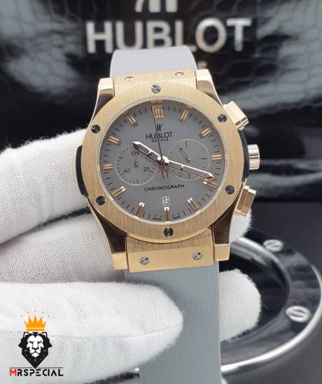 معرفی ساعت مچی مردانه هابلوت کرنوگراف 01410 HUBLOT BIG BANG ساعت مردانه  هابلوت مدل بیگ بنگ ازخاص ترین مدل های خانواده‌ی مشهور هابلوت با بیشترین طرفدار در دنیا می‌باشد. موتور این ساعت کوارتز کرنوگراف ساخت سوییس می‌باشد . جنس بند نیز رابر سیلیکونی ضد اب میباشد. جنس شیشه و قاب این ساعت به ترتیب از سافایر ضد خش و استینلس استیل ضد حساسیت و ضد زنگ می‌باشد و دارای قابلیت نمایش تقویم است . رنگ قاب رزگلد و با صفحه طوسی رنگ میباشد.