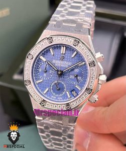 ساعت زنانه اودمار پیگه کرنوگراف بند استیل صفحه ابی قاب نگین AUDEMARS PIGUET ROYAL 021058