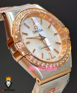 ساعت امگا زنانه کانسلیشن دورنگ رزگلد قاب نگین صفحه سفید صدف OMEGA CONSTELLATION 021598