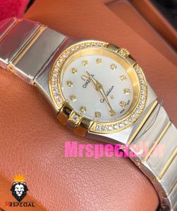 ساعت امگا زنانه مدل کانسلیشن دو رنگ طلایی صفحه صدف قاب نگین OMEGA constllation 020948 