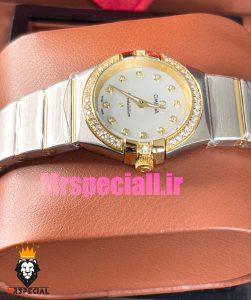 ساعت امگا زنانه مدل کانسلیشن دو رنگ طلایی صفحه صدف قاب نگین OMEGA constllation 020948 