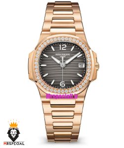 ساعت پتک فیلیپ زنانه مدل ناتیلوس کوارتز رزگلد قاب نگین صفحه طوسی Patek Philippe NUATILOS 021269