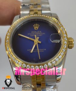 ساعت زنانه رولکس دیت جاست کوارتز قاب نگین دورنگ طلایی صفحه ابی مشکی 020831 ROLEX DATEJUST