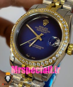 ساعت زنانه رولکس دیت جاست کوارتز قاب نگین دورنگ طلایی صفحه ابی مشکی 020831 ROLEX DATEJUST