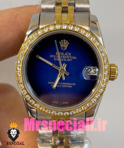 ساعت زنانه رولکس دیت جاست کوارتز قاب نگین دورنگ طلایی صفحه ابی مشکی 020831 ROLEX DATEJUST